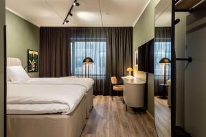 Una cama o camas en una habitación de Scandic Lahti City