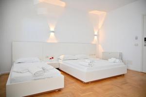 Postel nebo postele na pokoji v ubytování Thea Hotel + 19 fotografií