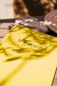 a yellow notebook with the word speed written on it at beppo Restaurant Suites in Backnang +18 photos