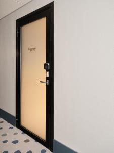 Voodi või voodid majutusasutuse Bob W Helsinki Kamppi toas