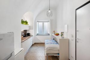Kuchyň nebo kuchyňský kout v ubytování Lubrense Signature Suites