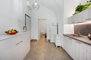 Kuchyň nebo kuchyňský kout v ubytování Lubrense Signature Suites