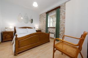 Ένα ή περισσότερα κρεβάτια σε δωμάτιο στο Villa Krasa ZadarVillas +31 φωτογραφίες