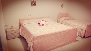 A bed or beds in a room at Casa Vacanza Dal Cavaliere