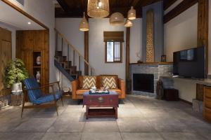 Posezení v ubytování Hidden Moisture and Return to Simplicity Homestay in Mount Huangshan