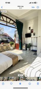 a bedroom with two beds in a room at Hotel Ngọc My in Phan Thiet