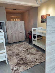 Postel nebo postele na pokoji v ubytování Guesthouse Prizreni