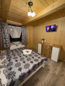 Postel nebo postele na pokoji v ubytování Chata na Grapie
