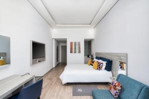 Un ou plusieurs lits dans un hébergement de l'établissement Marina Bay City Center