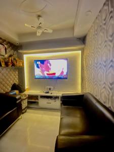 TV a/nebo společenská místnost v ubytování Cozy Inn Hostel