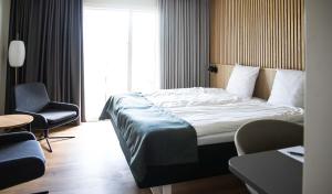 Voodi või voodid majutusasutuse Hotel Faaborg Fjord toas