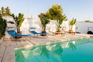 Bazén v ubytování Villa Bali con piscina e giardino privato By Cala Salento nebo v jeho okolí