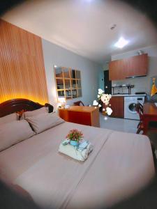 Η κουζίνα ή μικρή κουζίνα στο Relaxing Getaway at Saekyung Phase 3 near airport +43 φωτογραφίες