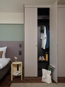 Voodi või voodid majutusasutuse Bob W Helsinki Kamppi toas