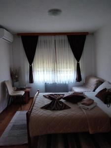 Postel nebo postele na pokoji v ubytování Plitvice House Milan