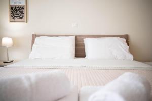 Postel nebo postele na pokoji v ubytování La bohème