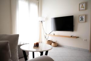 TV a/nebo společenská místnost v ubytování La bohème