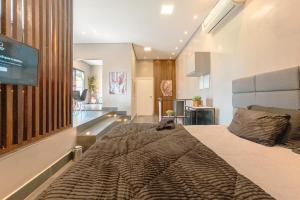 Μια τηλεόραση ή/και κέντρο ψυχαγωγίας στο Lindo Espaço Local Nobre Próximo Catedral