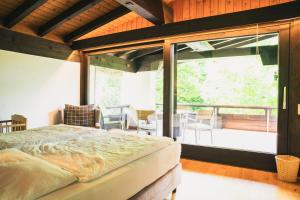 Postel nebo postele na pokoji v ubytování Villa Werdenberg