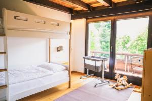 Postel nebo postele na pokoji v ubytování Villa Werdenberg