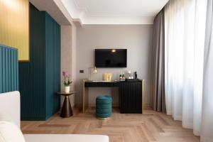 Kuchyň nebo kuchyňský kout v ubytování Je Rome Hotel
