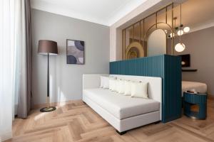 Postel nebo postele na pokoji v ubytování Je Rome Hotel