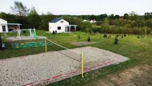 an aerial view of a park with a playground at Domek Jozef z prywatnym duzym Jacuzzi i sauna Przystan pod niebem in Łęzyce +14 photos