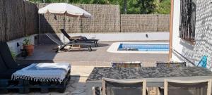 Bazén v ubytování La casita nebo v jeho okolí