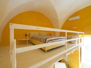 Posteľ alebo postele v izbe v ubytovaní Relais Carlo V - Palazzo Storico