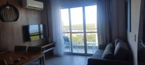 TV/trung tâm giải trí tại Apartamento no Aqualand Resort