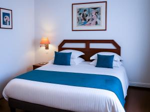 Postel nebo postele na pokoji v ubytování Hotel Du Parc - Mulhouse Centre + 37 fotografií
