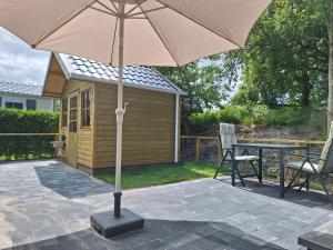 Zahrada ubytování Tiny Chalet Luttikduin Nr 25