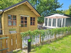 Zahrada ubytování Tiny Chalet Luttikduin Nr 25