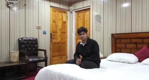 Postelja oz. postelje v sobi nastanitve Black Stone Suites Skardu