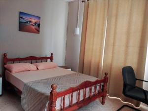 Postel nebo postele na pokoji v ubytování YUTI Style Trendy Home Vibes