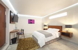 TV a/nebo společenská místnost v ubytování Hotel Urban 101