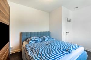 Postel nebo postele na pokoji v ubytování Stadtvilla