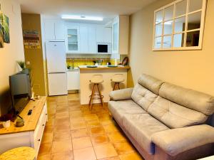 Η κουζίνα ή μικρή κουζίνα στο Acogedor Apartamento en Camaleño +19 φωτογραφίες