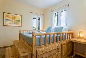 Postel nebo postele na pokoji v ubytování Mi Casa South Rhodes