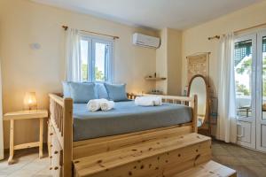 Postel nebo postele na pokoji v ubytování Mi Casa South Rhodes