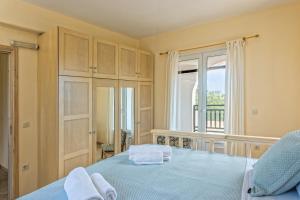 Postel nebo postele na pokoji v ubytování Mi Casa South Rhodes + 51 fotografií