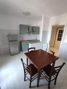 Kuchyň nebo kuchyňský kout v ubytování Guest house Sinisi