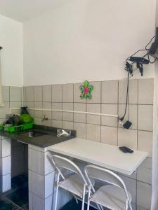 A cozinha ou cozinha compacta de Pousada Recanto das Tartarugas