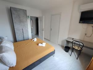 Postel nebo postele na pokoji v ubytování Guest house Sinisi