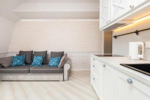 Kuchnia lub aneks kuchenny w obiekcie Apartments Tartaczna 2 - Gdansk Old Town by Noclegi Renters