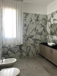Koupelna v ubytování Hotel Marechiaro - Direttamente sul mare