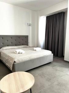 Postel nebo postele na pokoji v ubytování Hotel Marechiaro - Direttamente sul mare