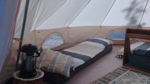 Postel nebo postele na pokoji v ubytování tipi nature, spa privé
