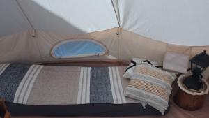 Postel nebo postele na pokoji v ubytování tipi nature, spa privé