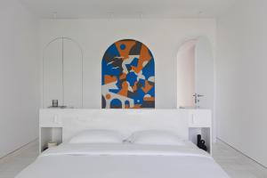 Letto o letti in una camera di Kassandra Palace Seaside Resort